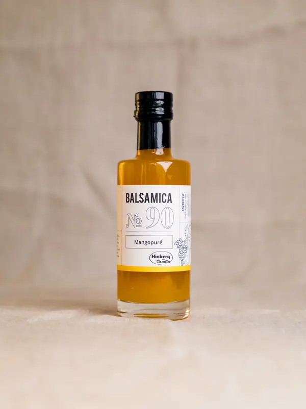 Flaske med Mangopuré (250 ml) – naturlig fruktpuré laget av modne mango uten tilsetninger. Ideell til desserter, smoothies og sauser.